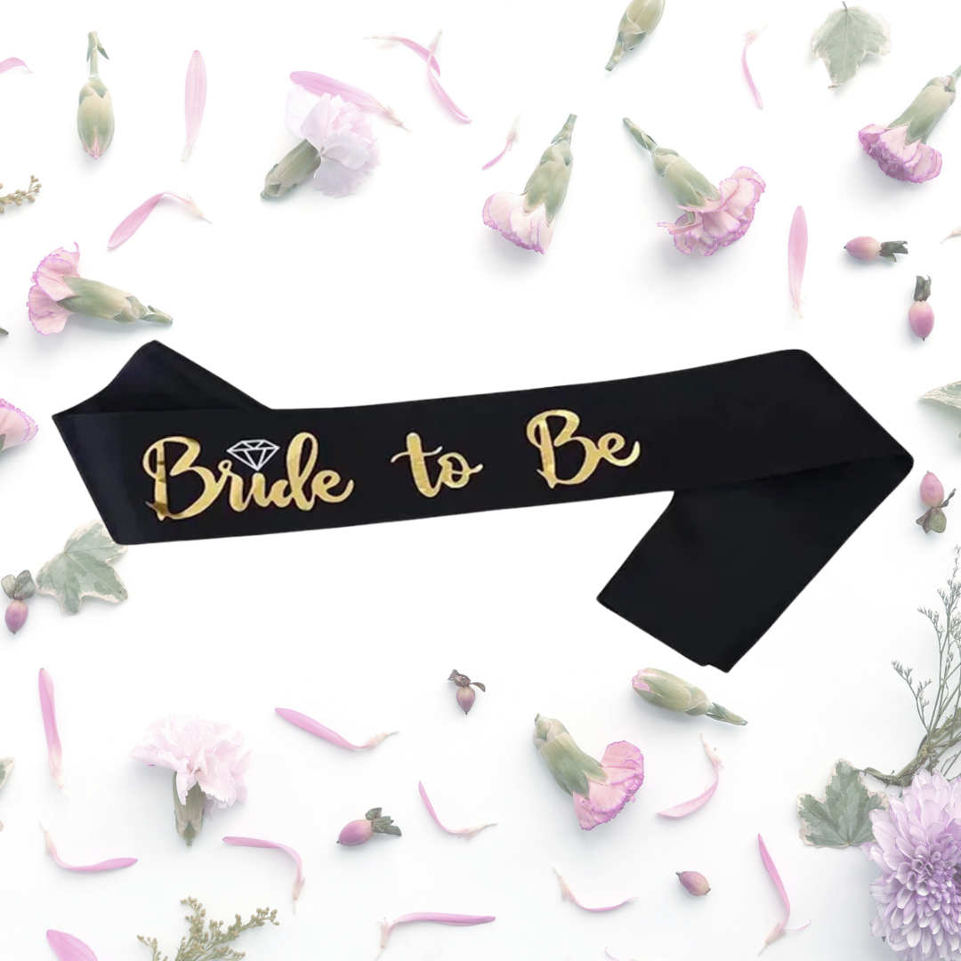 Gold Bride to be in black sash